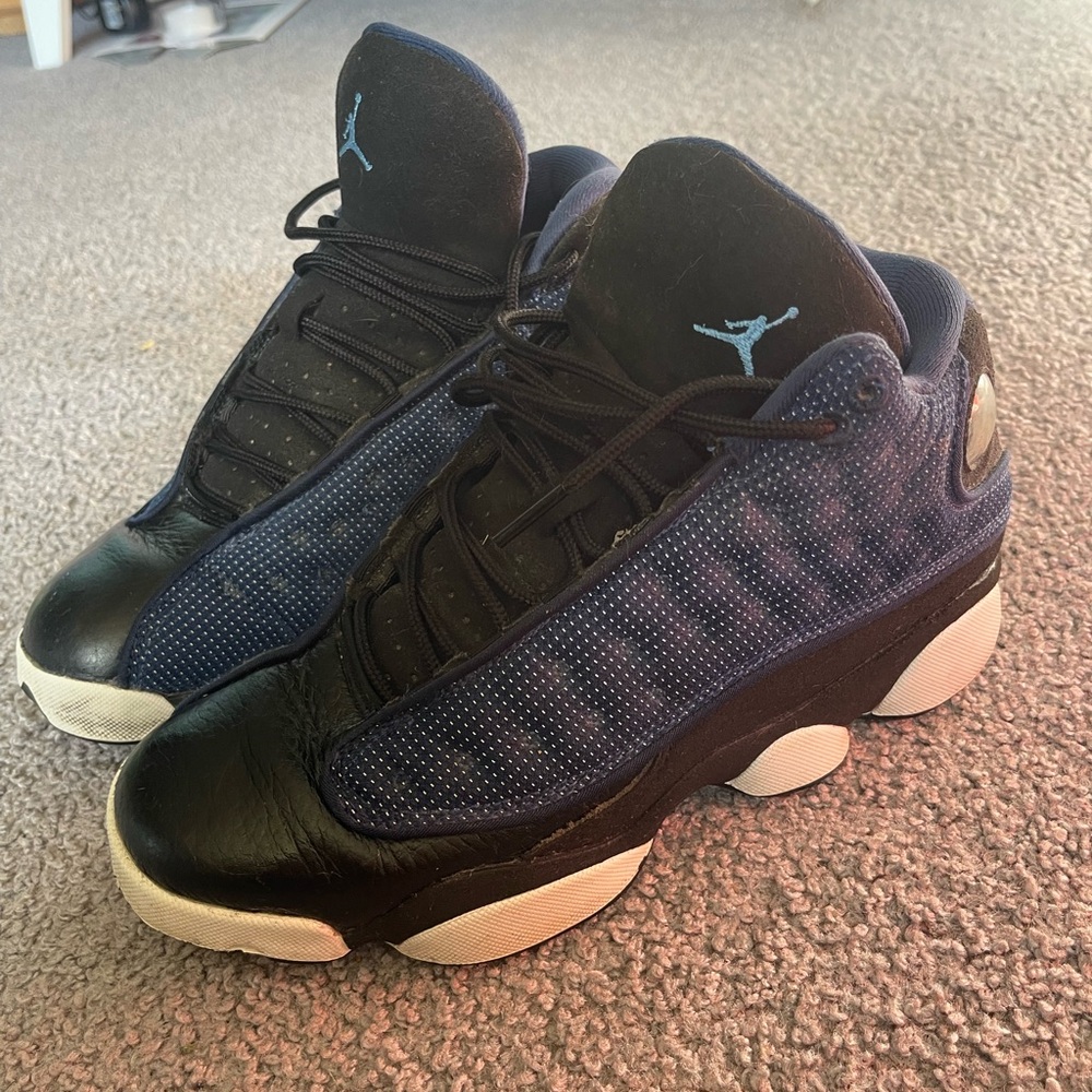 Jordan 13. Youth size 7. Will fit women’s size 7 and 8. Midnight blue